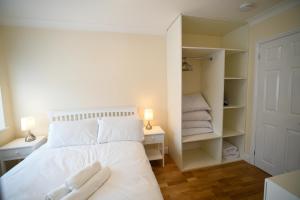 Fennec Apartments tesisinde bir odada yatak veya yataklar