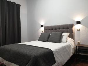 Posteľ alebo postele v izbe v ubytovaní Hostal Cuzco