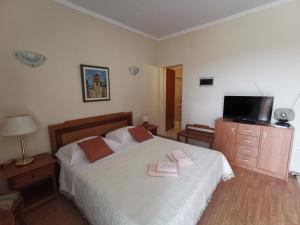 Ein Bett oder Betten in einem Zimmer der Unterkunft House Smajić