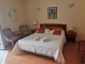 Ein Bett oder Betten in einem Zimmer der Unterkunft House Smajić
