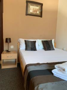 Ein Bett oder Betten in einem Zimmer der Unterkunft Guest Accommodation Zone