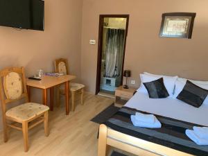 Ein Bett oder Betten in einem Zimmer der Unterkunft Guest Accommodation Zone