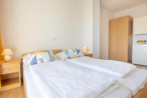 Postel nebo postele na pokoji v ubytování Steko Accomodations