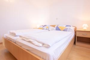 Postel nebo postele na pokoji v ubytování Steko Accomodations