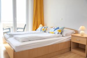Postel nebo postele na pokoji v ubytování Steko Accomodations