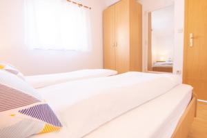 Postel nebo postele na pokoji v ubytování Steko Accomodations