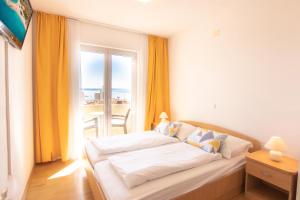 Postel nebo postele na pokoji v ubytování Steko Accomodations