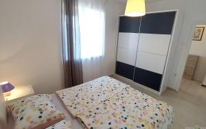 Postel nebo postele na pokoji v ubytování Pure nature coastal apartment VLASTA