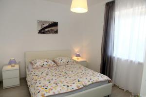 Postel nebo postele na pokoji v ubytování Pure nature coastal apartment VLASTA