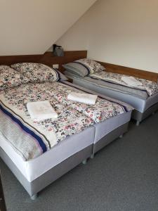 Postel nebo postele na pokoji v ubytování Strama Kościelisko
