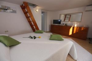 En eller flere senge i et værelse på Holiday Home Villa Di + 44 billeder