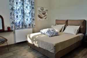 Postel nebo postele na pokoji v ubytování Lucas home