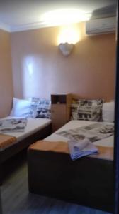 Postel nebo postele na pokoji v ubytování apartmani Zoran Bilić