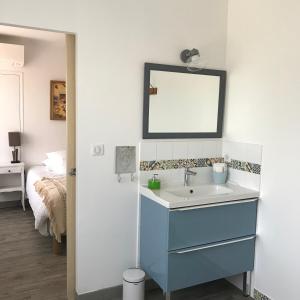 Ванна кімната в Chambres d'Hôtes et Gîtes Le Mas Mellou