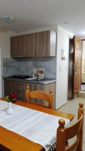 A kitchen or kitchenette at Fyllou Apartment Asprovalta