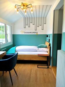 
Ein Bett oder Betten in einem Zimmer der Unterkunft Gasthof zur Bündte
