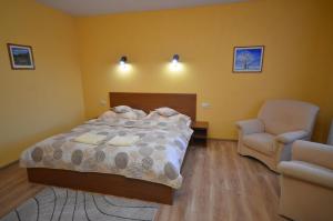 Posteľ alebo postele v izbe v ubytovaní Apartmány Best I. Bešeňová