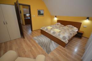 Posteľ alebo postele v izbe v ubytovaní Apartmány Best I. Bešeňová