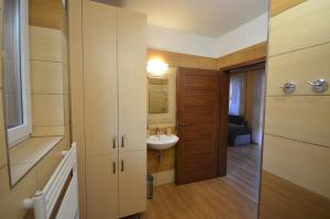 Kúpeľňa v ubytovaní Apartmány Best I. Bešeňová + 37 fotografií