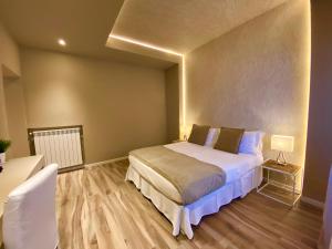 Posteľ alebo postele v izbe v ubytovaní Harmony House Prestige