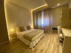 Posteľ alebo postele v izbe v ubytovaní Harmony House Prestige