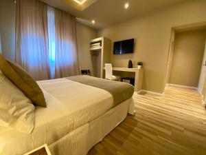 Posteľ alebo postele v izbe v ubytovaní Harmony House Prestige