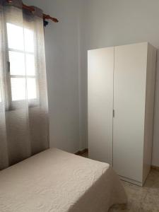 A bed or beds in a room at calle Eusebio Carballo II