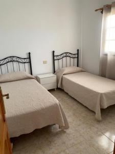 A bed or beds in a room at calle Eusebio Carballo II