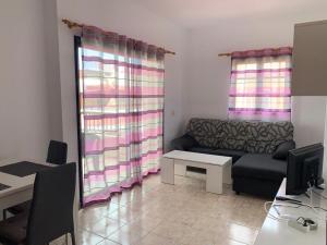 A seating area at calle Eusebio Carballo II