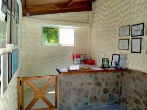 a room with a stone counter with a window at Alona Austria Resort in Panglao Island