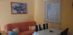 Khu vực ghế ngồi tại Rooms and Apartments V&M