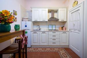 Η κουζίνα ή μικρή κουζίνα στο Sweet Suite V&V +39 φωτογραφίες