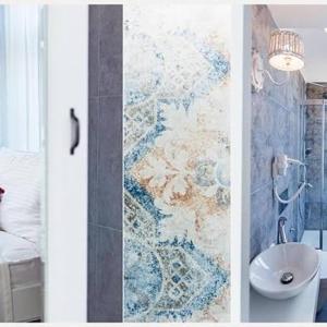 a bathroom with a sink and a shower with a tapestry at Konak phaedra ( fedra ) in Bozcaada