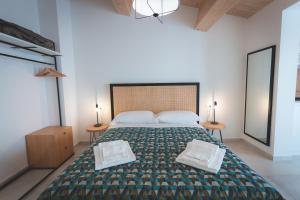 Posteľ alebo postele v izbe v ubytovaní Via Siena 4 - Suites & Rooms