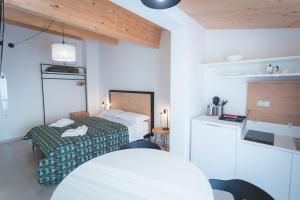 Posteľ alebo postele v izbe v ubytovaní Via Siena 4 - Suites & Rooms
