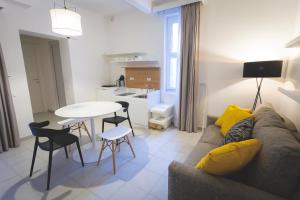 Posedenie v ubytovaní Via Siena 4 - Suites & Rooms