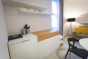 Kuchyňa alebo kuchynka v ubytovaní Via Siena 4 - Suites & Rooms
