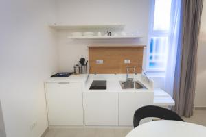 Kuchyňa alebo kuchynka v ubytovaní Via Siena 4 - Suites & Rooms