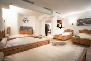 Postel nebo postele na pokoji v ubytování Hotel Brugger