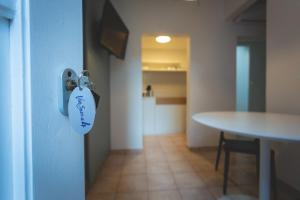Televízia a/alebo spoločenská miestnosť v ubytovaní Via Siena 4 - Suites & Rooms