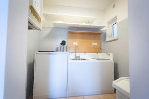 Kitchen o kitchenette sa Via Siena 4 - Suites & Rooms