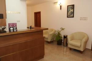 a waiting room at a hospital with two chairs at Villa Valeev in Sozopol +44 photos