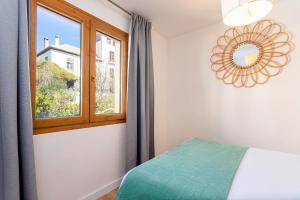 Postel nebo postele na pokoji v ubytování Genteel Home Alhacaba + 12 fotografií