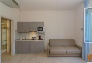 Kuchyň nebo kuchyňský kout v ubytování Hotel Sogno