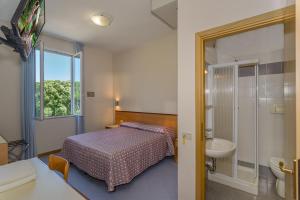 Katil atau katil-katil dalam bilik di Hotel Sogno