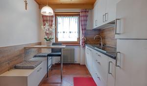 Una cocina o zona de cocina en Residence A Val