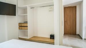 Ένα ή περισσότερα κρεβάτια σε δωμάτιο στο Anfi Suites