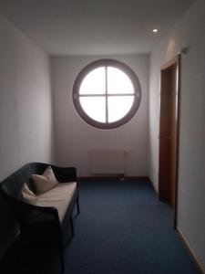 Ein Sitzbereich in der Unterkunft Gästehaus Germania