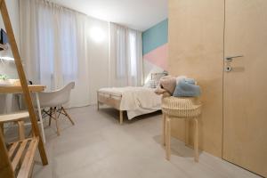 Postel nebo postele na pokoji v ubytování Mirandolina Venice Exclusive Guesthouse