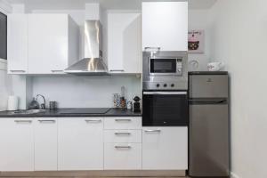Virtuvė arba virtuvėlė apgyvendinimo įstaigoje Camp Nou , Fira Barcelona Apartment